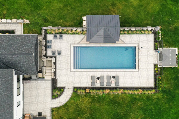 Backyard Landscape Design of a Pool and Patio in Ottawa, Kemptville by VS Landscape